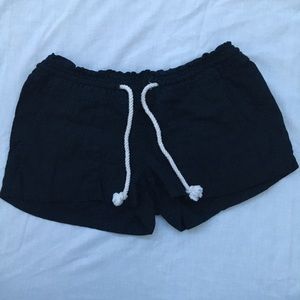 Navy blue shorts.